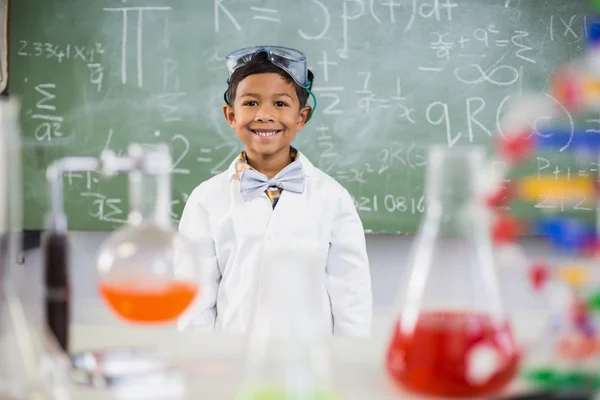 Schoolboy with chemical flask