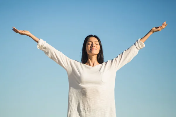 Woman stretching out her arms - Stock Image - Everypixel