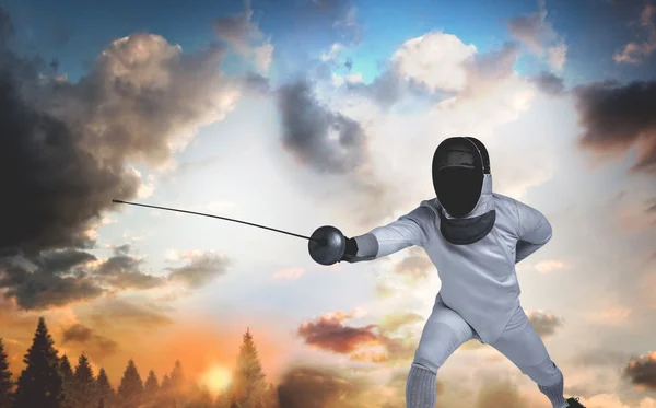 Man in fencing suit practicing with sword