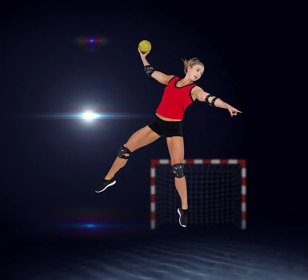 Athlete with elbow pads throwing handball