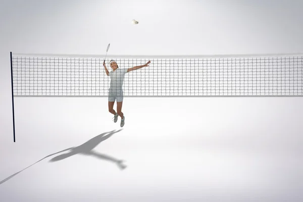 Badminton player playing badminton