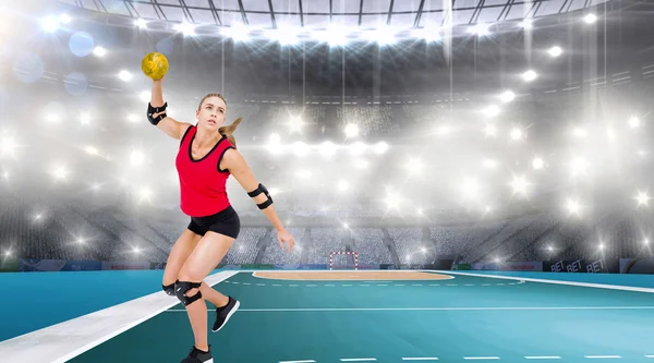 Athlete with elbow pads throwing handball