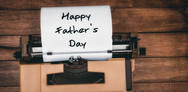 Happy fathers day written on paper