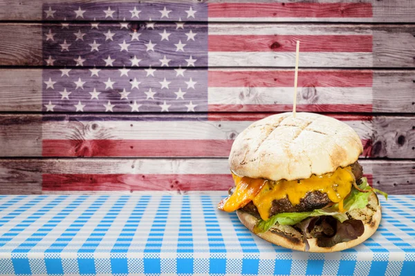 Composite image of focus on hamburger