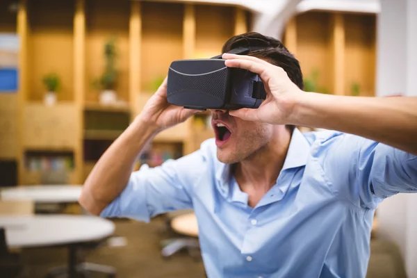 Businessman enjoying augmented reality headset
