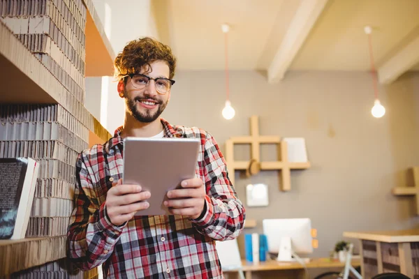 Portrait of graphic designer using digital tablet