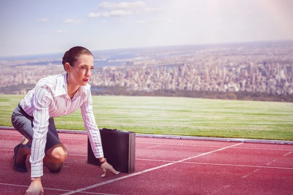 Businesswoman in starting position