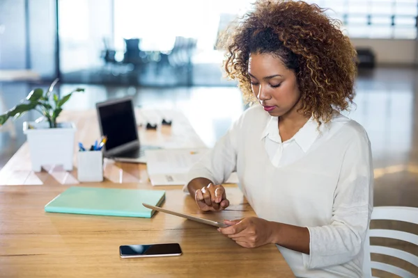 Woman using digital tablet