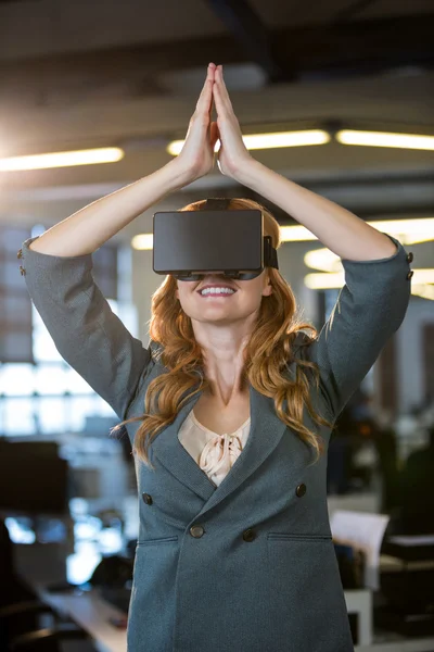 Businesswoman using virtual reality simulator