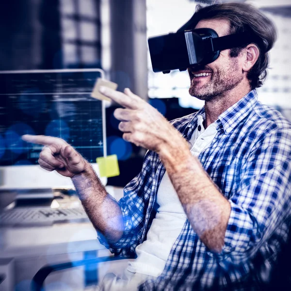 Creative businessman using virtual reality simulator