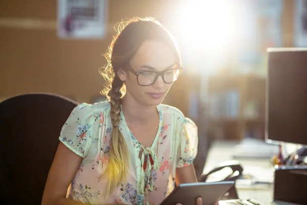 Business executive using digital tablet