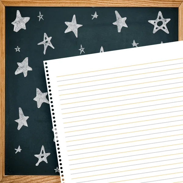 Star drawings against spiral notepad