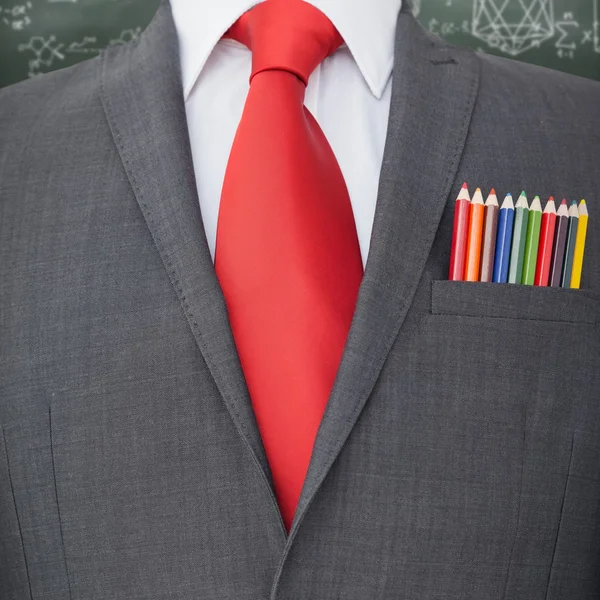 Colored pencils in businessman coat pocket