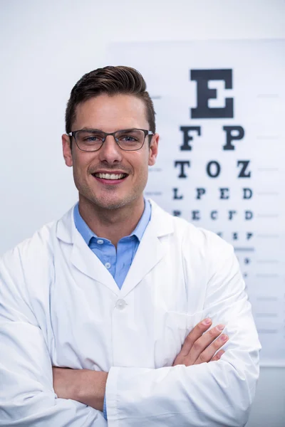 Optometrist smiling in ophthalmology clinic
