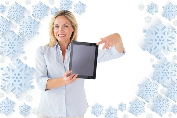 Blonde pointing to her tablet pc screen