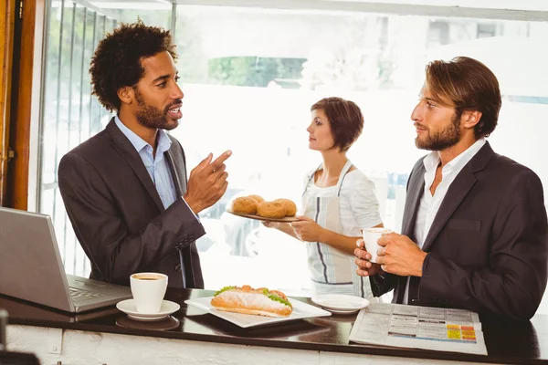 Businessmen enjoying their lunch hour