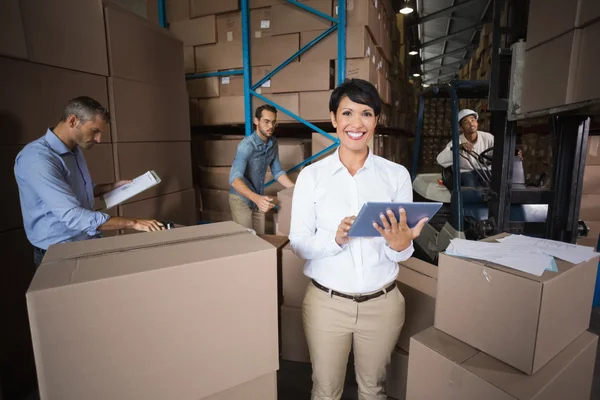 Warehouse workers preparing shipment in