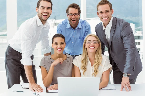 Business people with laptop at office