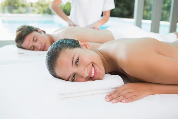 Couple enjoying massage at health farm