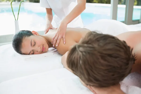 Couple enjoying massage at health farm