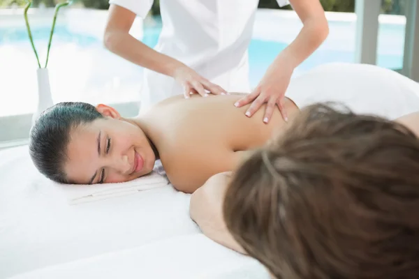 Couple enjoying massage at health farm