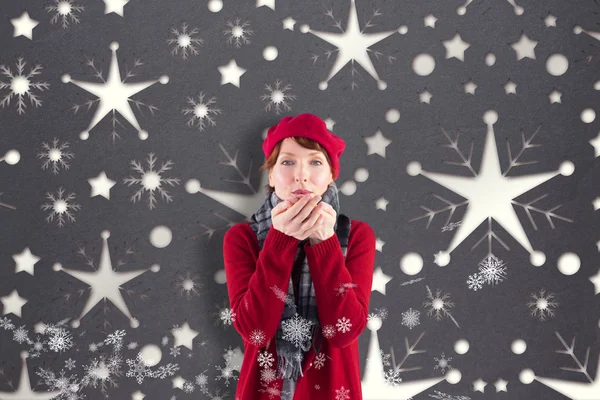 Composite image of woman blowing kiss to camera