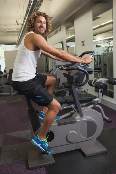 Man working out on exercise bike