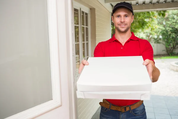 Pizza delivery man delivering pizzas