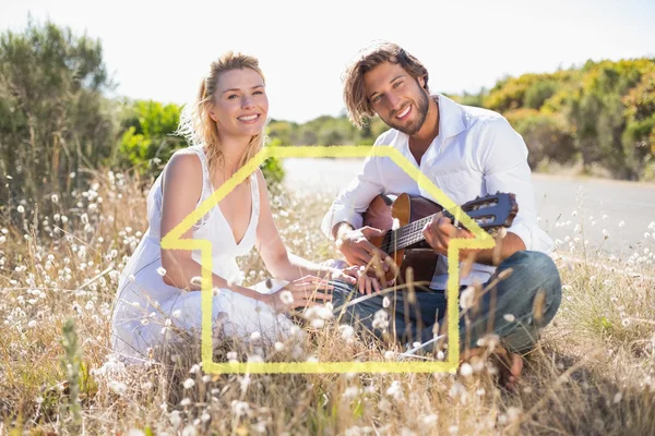 Handsome man serenading his girlfriend