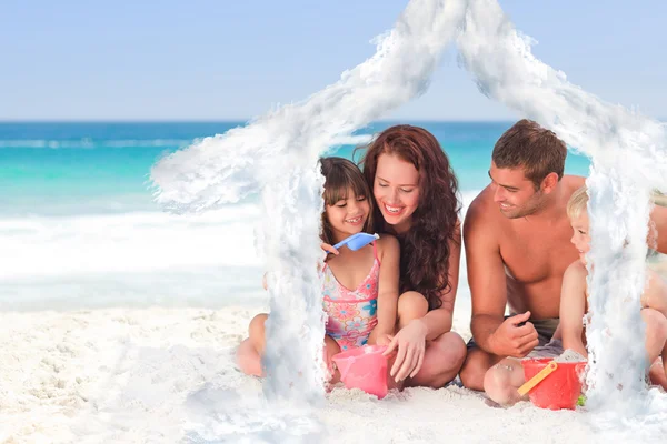 Composite image of portrait of a family at the beach