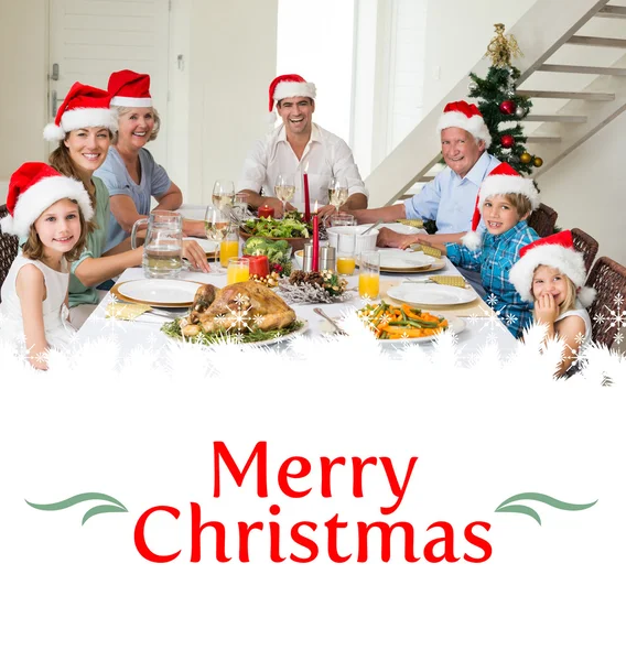 Family at dining table for christmas dinner