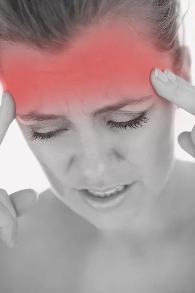 Unhappy woman with severe headache