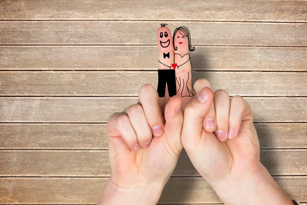 Composite image of fingers crossed like a couple