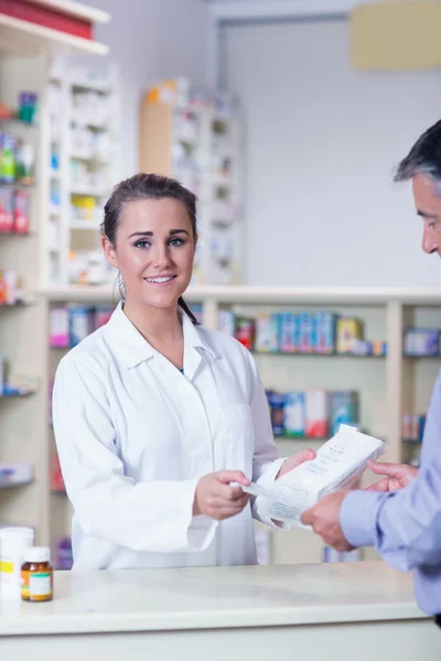 Pharmacist holding a prescription