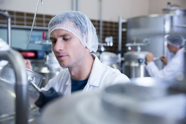 Close up of a man wearing a hair net