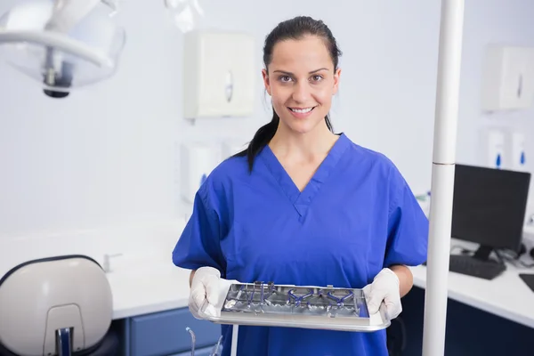 Dentist holding tray with equipment
