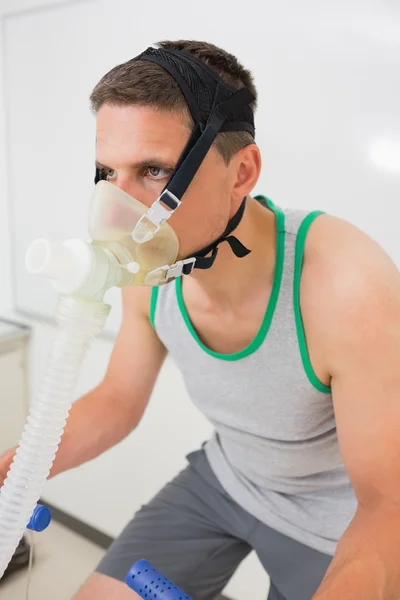 Man doing fitness test on exercise bike