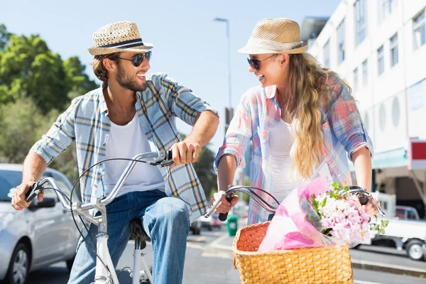 Attractive couple on a bike ride