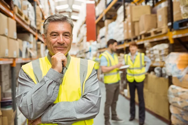 Portrait of smiling warehouse manager