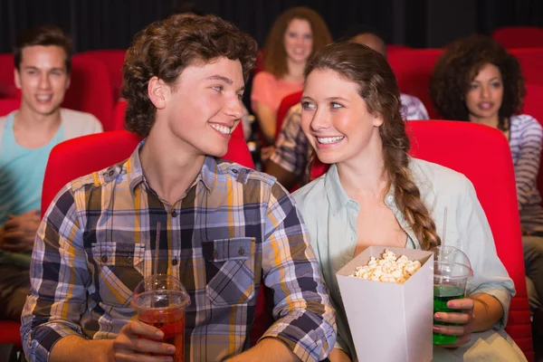 Young couple watching a film