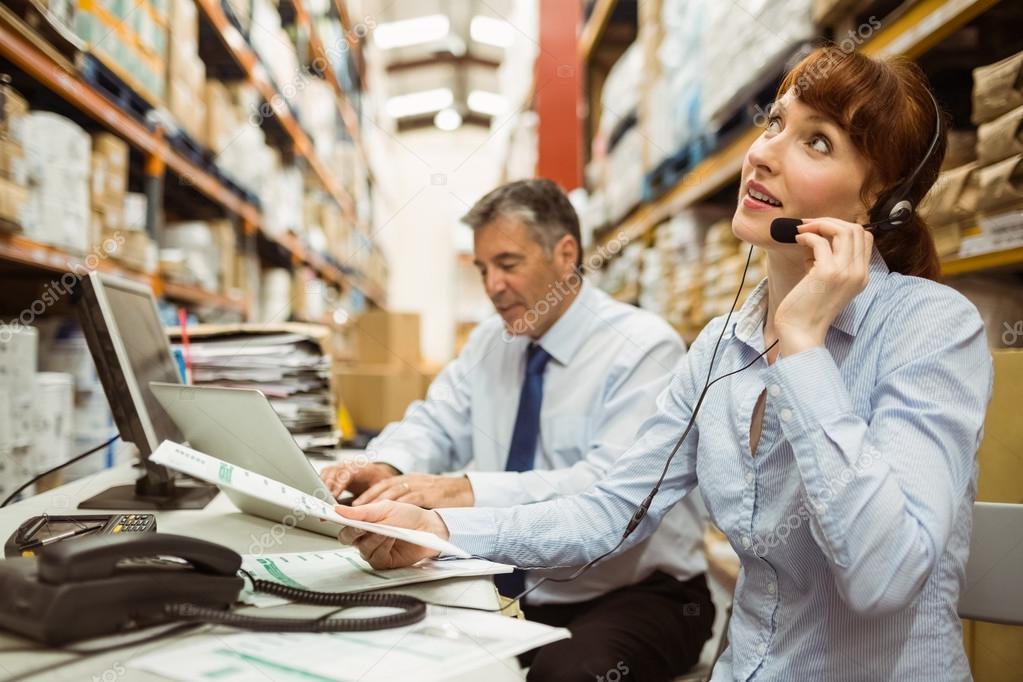 http://st2.depositphotos.com/1518767/6555/i/950/depositphotos_65552867-Warehouse-manager-working-at-her-desk-wearing-headset.jpg