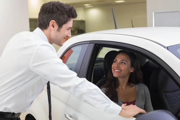 Salesperson speaking with happy client