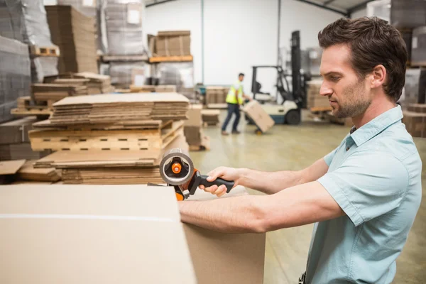 Warehouse worker preparing shipment