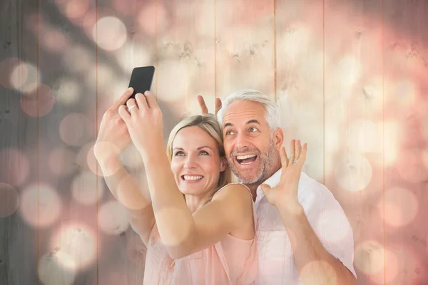 Happy couple posing for a selfie