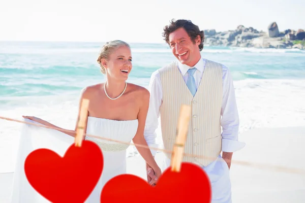 Newlyweds walking hand in hand