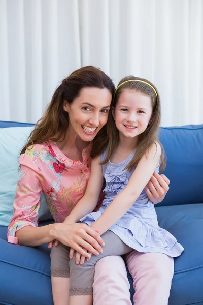 Mother and daughter on the couch