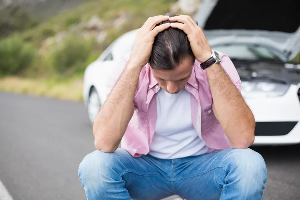 Stressed man after car breakdown