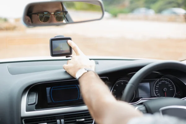 Man using satellite navigation system