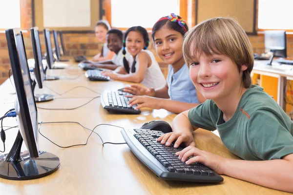 Cute pupils in computer class