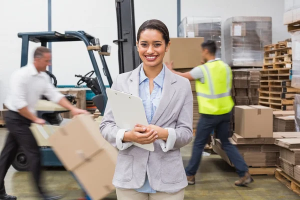 Female manager holding files